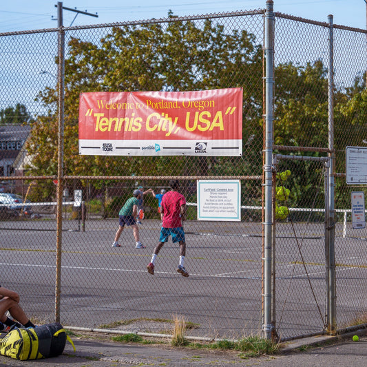 Photo of the Chapman Cup tournament and the Portland Tennis Courterly Banner
